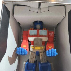 The Transformers Optimus Prime The Original Phone And Game Controller Holder